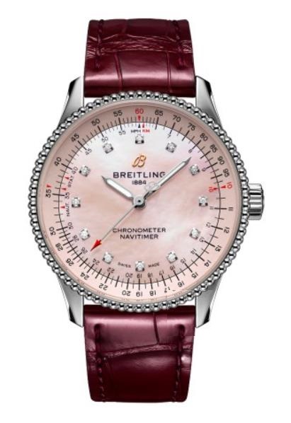The pink mother-of-pearl dial fake watch has diamond hour marks.